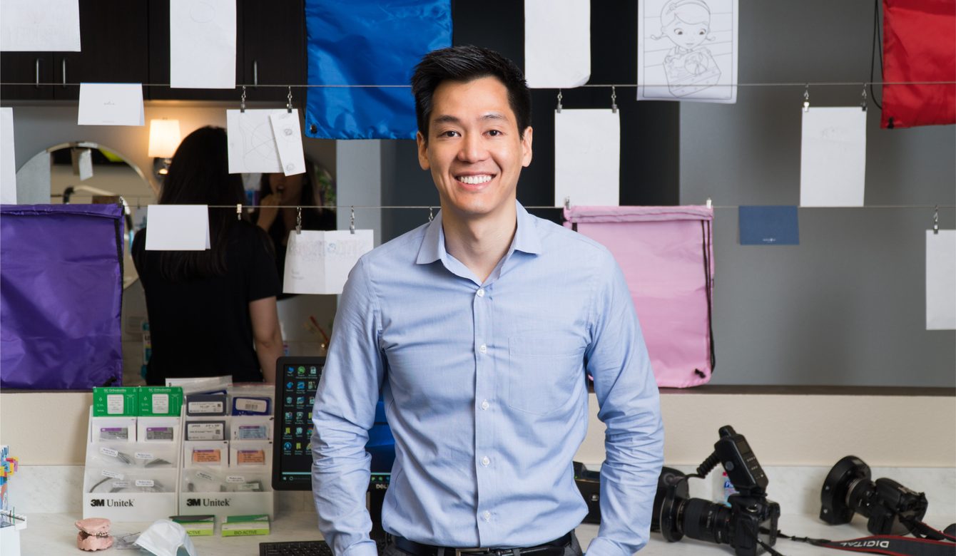 Dr. Bryan Hsu at the Smile Makers Orthodontics front desk