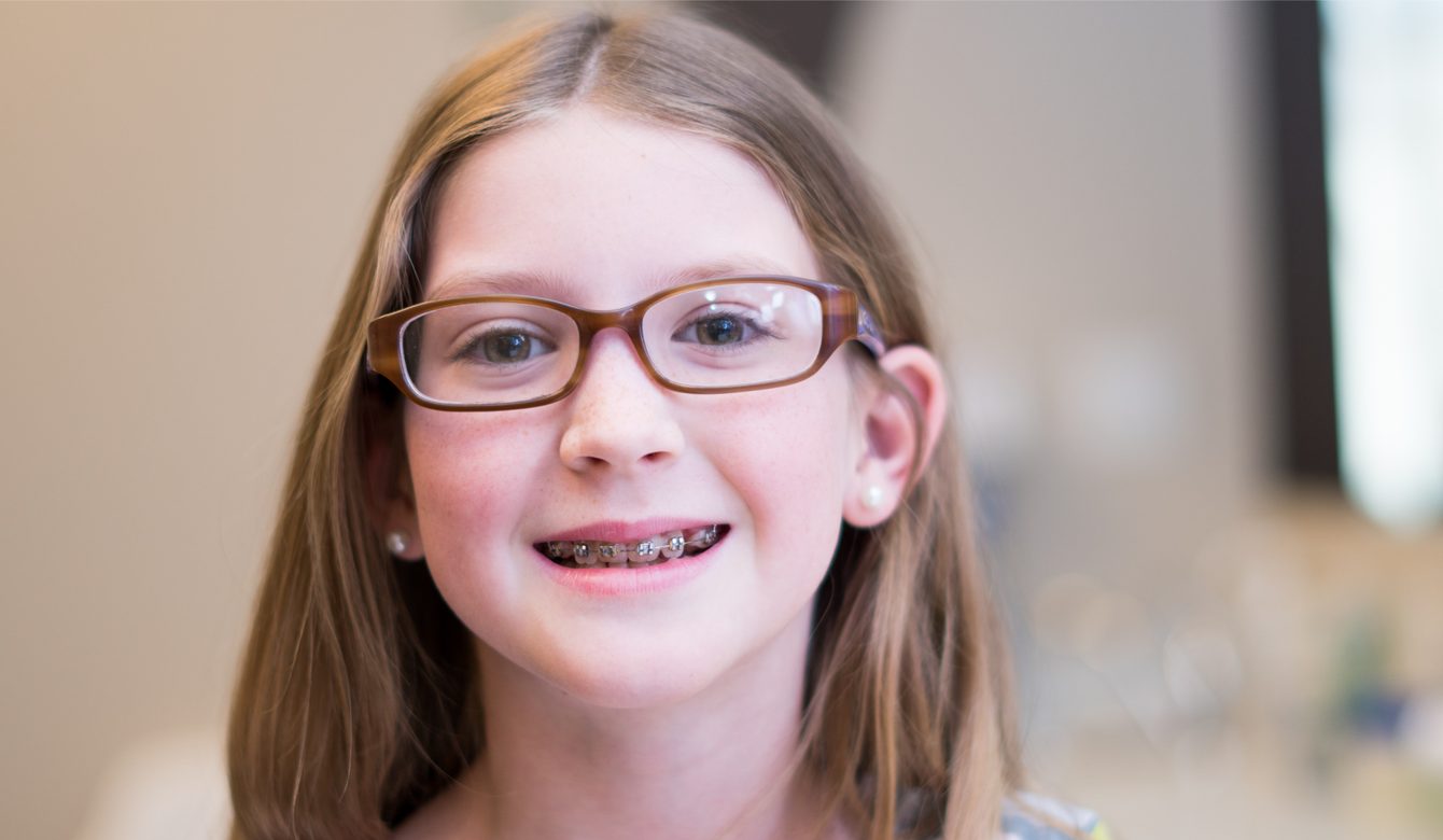 Young Smile Makers Orthodontics patient smiling with braces