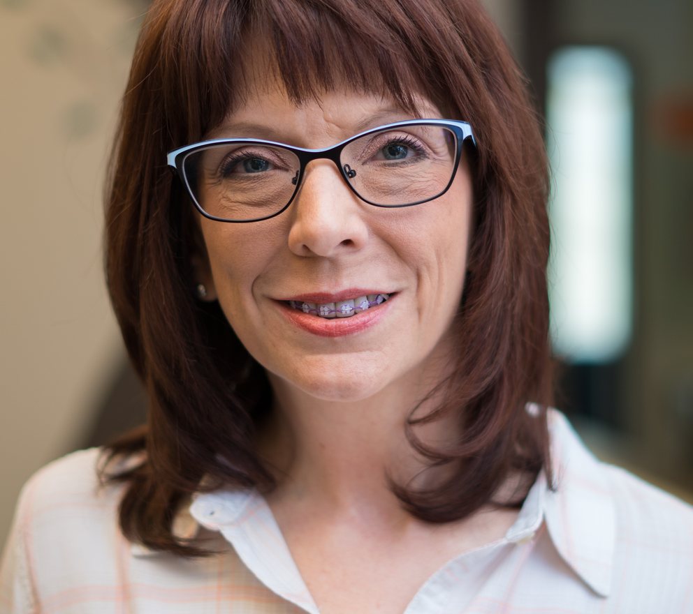 Adult Smile Makers Orthodontics patient smiling with braces
