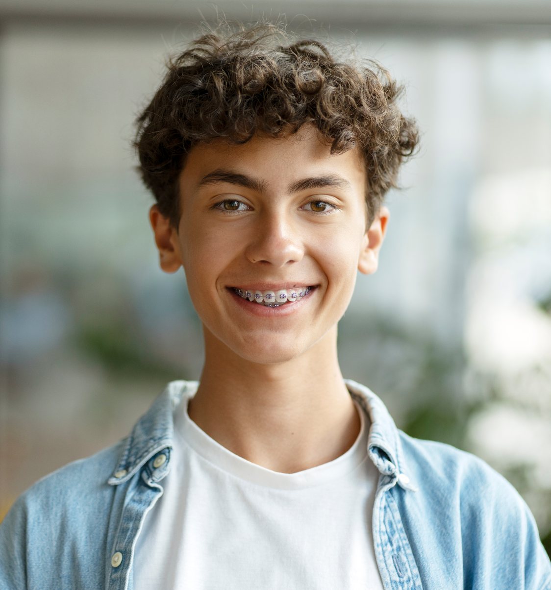 Teenage Smile Makers Orthodontics patient smiling with braces